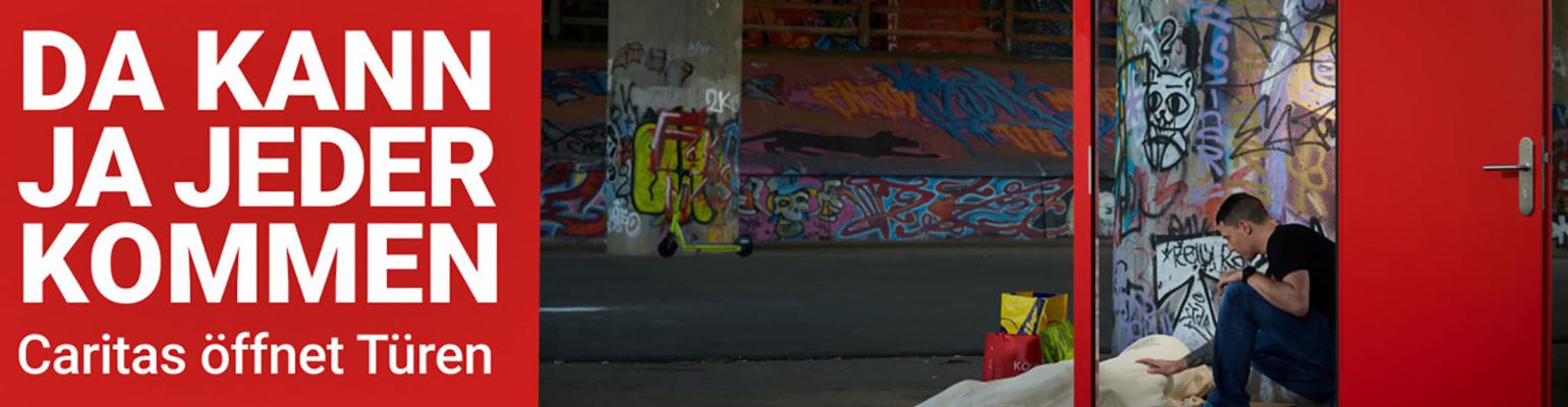 Slider, auf dem ein Mann einem Obdachlosen hilft. (c) Caritas Slider, auf dem ein Mann einem Obdachlosen hilft.